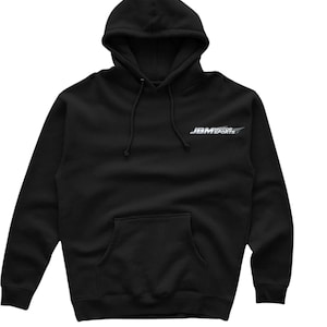 Puede incluir: Sudadera con capucha negra con un logotipo blanco que dice "JBM MOTOR SPORTS" en la parte delantera.