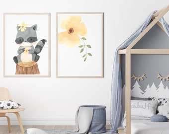 May include: Two watercolor prints, one featuring a raccoon holding a flower and the other a yellow flower with green leaves. The prints are hanging on a white wall above a wooden bed frame with a gray canopy and a white and gray patterned bedspread.