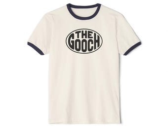 May include: A white t-shirt with a navy blue ringer. The shirt features a black oval logo with the text "THE GOOCH" in a retro font.