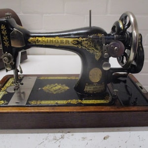 vintage singer sewing machine with hood image 1