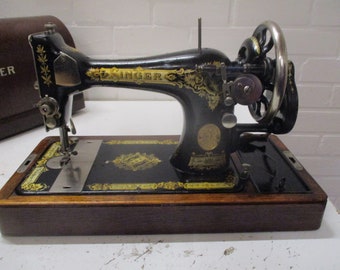 vintage singer sewing machine with hood