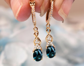 London Blue Topaz Earrings in Sterling Silver | Dainty Oval Gemstone