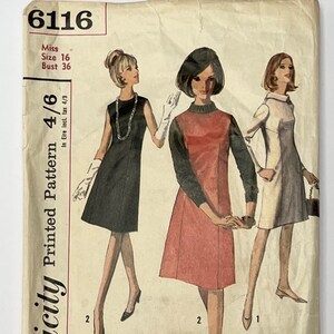 May include: Vintage Simplicity sewing pattern for a dress, size 16, bust 36. The pattern includes three different styles of dresses, one black, one red, and one white. The pattern is labelled "Simplicity Printed Pattern 4/6" and "Personal-Fit Patterns".