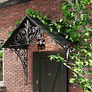 Beautiful handmade forged entrance canopies, Wrought iron entrance visor, Original forged entrance canopies.The roof measures 44,5 x 35 inch