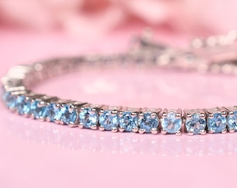 Swiss Blue Topaz Sterling Silver Tennis Bracelet, Round Cut