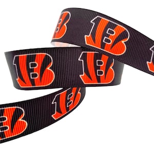 Bengals Ribbon. 5 yards single sided grosgrain ribbon. 7/8&quot; width. Made in USA.
