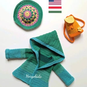 May include: A crocheted hooded jacket in shades of green and blue, a crocheted hat with pink, yellow, and green accents, and a small orange crocheted backpack with a yellow flower.