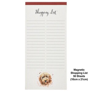 May include: A rectangular shopping list notepad with a red top border. The notepad features lined pages and the words "Shopping List" in elegant script. A watercolor illustration of a dog is at the bottom. The notepad measures 10cm x 21cm.