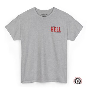 A gray t-shirt with the text "See you in Hell" in red lettering.