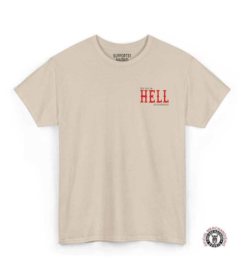 A beige t-shirt with the text "See you in Hell" in red lettering. The text "Support81 Madrid" is printed in black and red.
