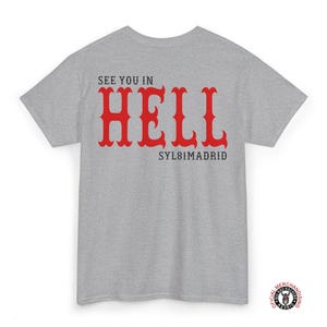 Gray t-shirt with red text that says "See you in HELL" and "SYL81MADRID" in black text.