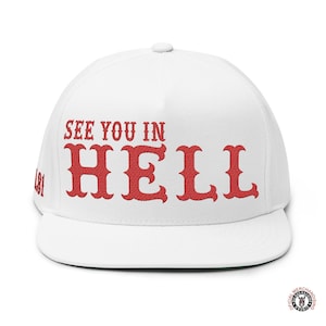 May include: White flat-brimmed cap with the text "SEE YOU IN HELL" embroidered in red. The number "181" is embroidered on the side. The cap has a green underside.