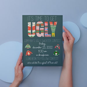May include: A teal blue poster with white text that reads "It's time to get UGLY" with a graphic of a Christmas sweater in each letter. The poster announces a company's ugly sweater contest on Friday, December 23, 2022 at 11:30 am in the breakroom. The poster also states that a luncheon will follow the contest.