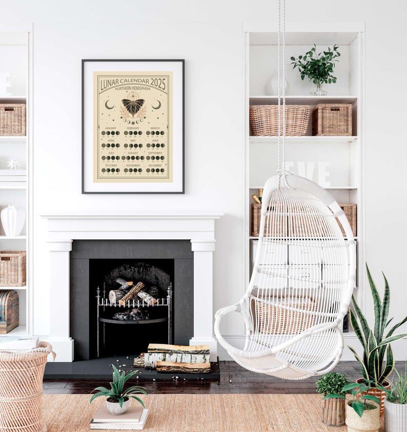 May include: A black framed poster with a beige background and the text "Lunar Calendar 2025 Northern Hemisphere". The poster features a calendar with moon phases and a black butterfly illustration.