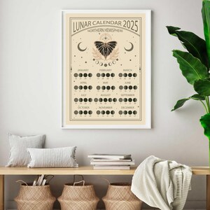 May include: A beige poster with a black butterfly and a lunar calendar for 2025. The calendar shows the phases of the moon for each month of the year. The poster has the text "Lunar Calendar 2025 Northern Hemisphere".