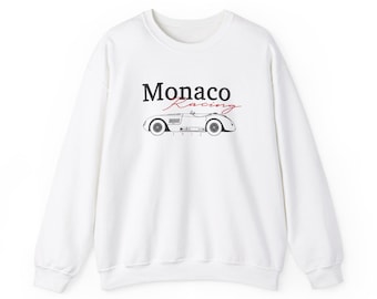 May include: White sweatshirt with a black and white illustration of a vintage race car and the text "Monaco Racing" in black and red.