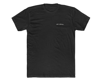 May include: Black t-shirt with the text "BE REAL" in white lettering.