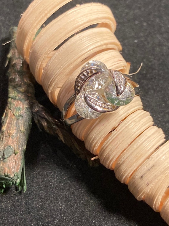 Three clear stone Floating ring set in silver tone - image 1