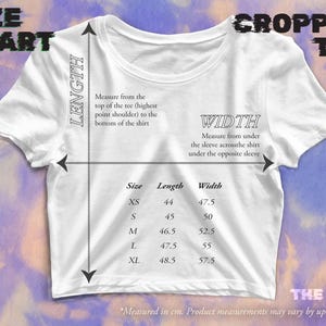 May include: Size chart for a cropped tee shirt. The chart shows the measurements in inches for the length and width of the shirt in sizes XS, S, M, L, and XL.