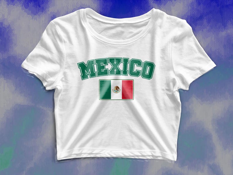 May include: White cropped t-shirt with the word "MEXICO" in green letters and the Mexican flag printed on the front.