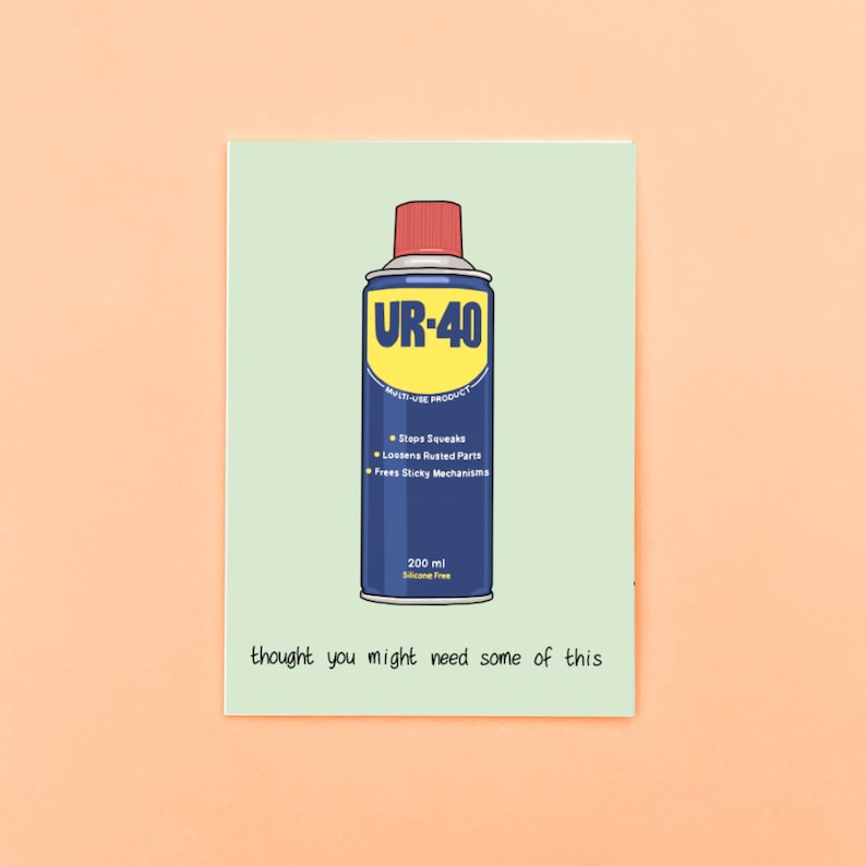 May include: A blue and yellow can of UR-40 multi-use product with the text "Stops Squeaks", "Loosens Rusted Parts", and "Frees Sticky Mechanisms". The can is labeled with "200 ml Silicone Free" and the text "thought you might need some of this".