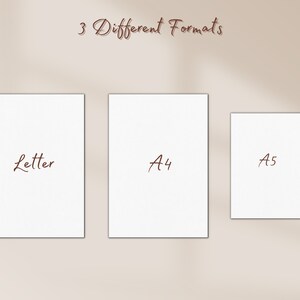 May include: Three white paper sheets with the words "Letter", "A4", and "A5" written in brown cursive on them. The sheets are arranged in a row from left to right, with the "Letter" sheet on the left, the "A4" sheet in the middle, and the "A5" sheet on the right. The sheets are on a light brown background.
