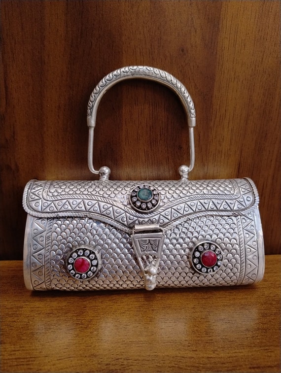 Buy Mesmerizing Silver Designer Bag Studded With Gems | Krishnapearls.com