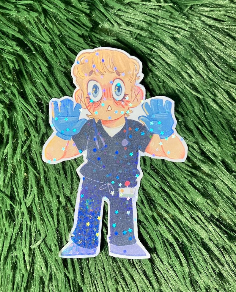 K&ouml;nnte beinhalten: Ein Aufkleber mit einer Cartoon-Illustration eines medizinischen Fachangestellten in blauer Arbeitskleidung. Die Figur hat helle Haut, blondes Haar und blaue Handschuhe. Die Arbeitskleidung ist mit blauen und goldenen Sternen verziert. Die Figur hat einen &uuml;berraschten Gesichtsausdruck.