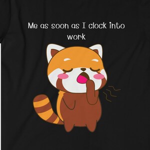 May include: Black t-shirt with a red panda cartoon illustration and the text "Me as soon as I clock into work".