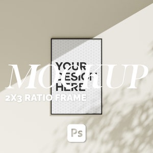 May include: A mockup of a 2x3 ratio frame with a white background and black grid pattern. The text "YOUR DESIGN HERE" is centered on the frame. The frame is on a beige wall with a shadow cast from the top left corner.