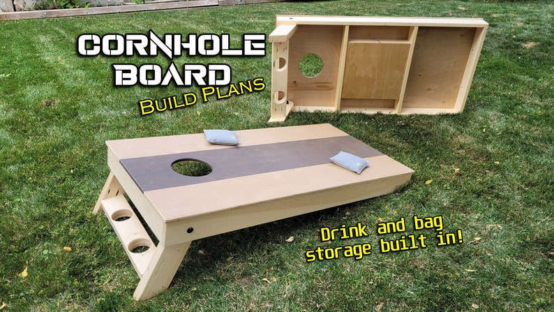 May include: A wooden cornhole board with a brown stripe and two holes. The board has a built-in drink and bag storage compartment. The text "CORNHOLE BOARD BUILD PLANS" is displayed on the image.