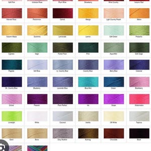 May include: A color chart featuring a grid of 68 rectangular swatches of embroidery thread, each labeled with its specific color name including Soft Pink, Autumn Red, Sunshine, Forest Floor, Blueberry, and Black, arranged in rows and columns.