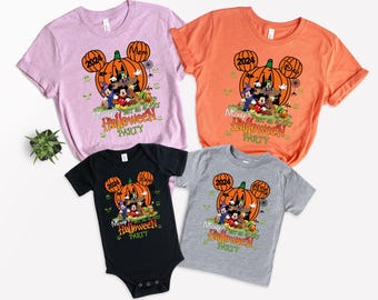 May include: Four shirts and a onesie with a Halloween theme. The shirts are in pink, orange, and gray, and the onesie is black. Each item features a pumpkin with Mickey Mouse ears and the text "Mickey's Not So Scary Halloween Party 2024."
