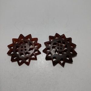 Pair of Vintage Reddish Brown Bone Star Buttons