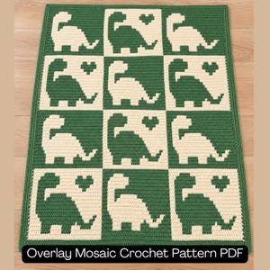 May include: A rectangular crochet blanket featuring a grid of twelve squares with alternating green and cream colors. Each square displays a silhouette of a dinosaur and a small heart. The text Overlay Mosaic Crochet Pattern PDF is visible.