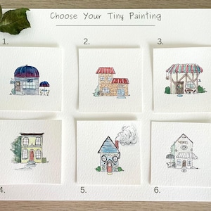 May include: Watercolor paintings of tiny houses are displayed on a white background. The phrase "Choose Your Tiny Painting" is written at the top. Each painting features a different house design, with varying colors and architectural styles.