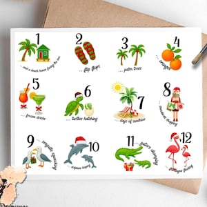 May include: A white card with colorful illustrations of beach-themed items, numbered 1-12. Includes images of a beach house, flip-flops, palm trees, oranges, frozen drinks, turtles, and flamingos. The card has the text "Pixie Decoupage".