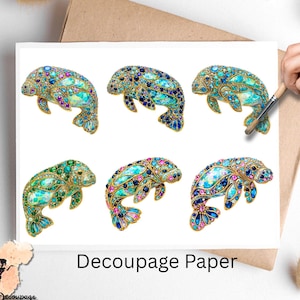 May include: Decoupage paper featuring six ornate manatee illustrations. Each manatee is adorned with colorful jewels in shades of blue, green, pink, and gold. The text "Decoupage Paper" is printed on the paper.