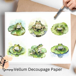 May include: Six watercolor illustrations of green frogs sitting on lily pads. The frogs are all facing forward and have their mouths closed. The lily pads are all green and have water droplets on them. The illustrations are on white vellum decoupage paper.