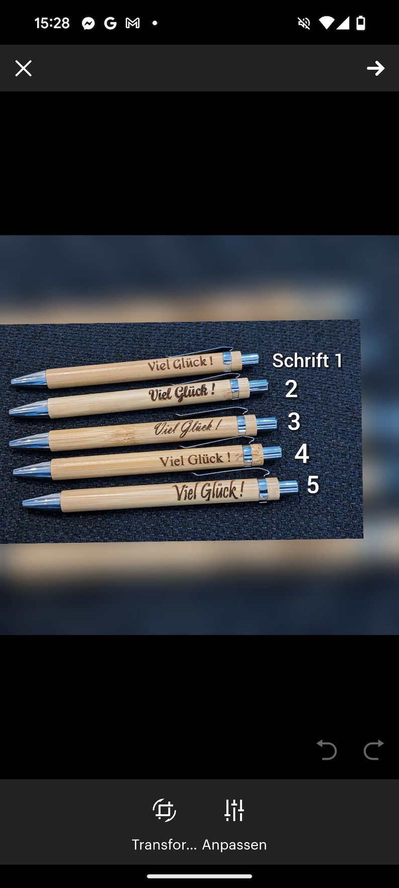 May include: Five bamboo pens with silver accents, each engraved with "Viel Gl&uuml;ck!" in different fonts. The text "Schrift 1-5" is also visible. These pens are ideal for gifting or personal use.