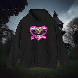 May include: Black hooded sweatshirt with a pink heart graphic featuring a skull with wings and the text "Dark Triumphant Fearxx Not Sans Fin".