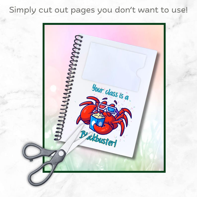 May include: A white spiral bound notebook with a red crab wearing 3D glasses and holding a bucket of popcorn. The notebook has a clear plastic pocket on the front cover and the text "Your class is a blockbuster!" printed on the front cover.