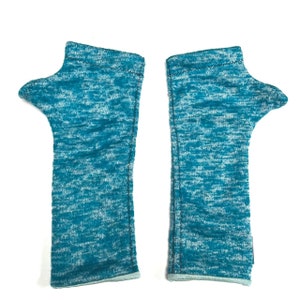 Fully lined wrist warmers. Made in the USA from upcycled fabric. Comes in variety of colors. Shop hand warmers.