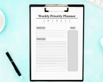 May include: A black clipboard with a white weekly priority planner. The planner has sections for "Need to do", "Want to do", and "Notes". There are checkboxes for each day of the week, Monday through Sunday.