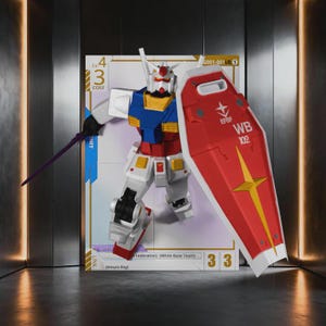May include: A Gundam robot action figure standing in front of a trading card. The robot is white, blue, red, and yellow, holding a purple beam saber and a large red shield with the text EFSF and WB 102. The card displays text including Lv. 4, 3 Cost, and Amuro Ray.