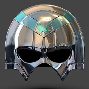 May include: A polished silver helmet featuring a teal bird emblem and accents. The helmet has a smooth, reflective finish and a visor with two eye openings. The bird emblem is teal and is positioned on the helmet's crown.