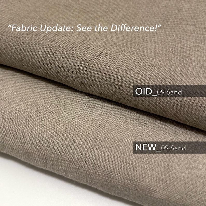 May include: Close-up of two fabric swatches, one labeled "OID_09 Sand" and the other labeled "NEW_09 Sand". The fabric is a light brown color with a woven texture.