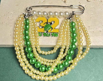 Pin de perla Chi Eta Phi 32