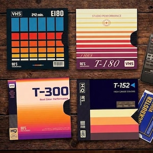 May include: Four square VHS tape cases with retro graphic designs in blue, red, orange, and yellow gradients. The covers feature text including E180, T-180, T-300, and T-152, along with 90's Memories branding, a remote control, and a partial membership card.