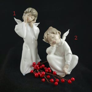 Lladro Angel figurines Mime Angel 4959 and Angel Dreaming 4961 sold individually